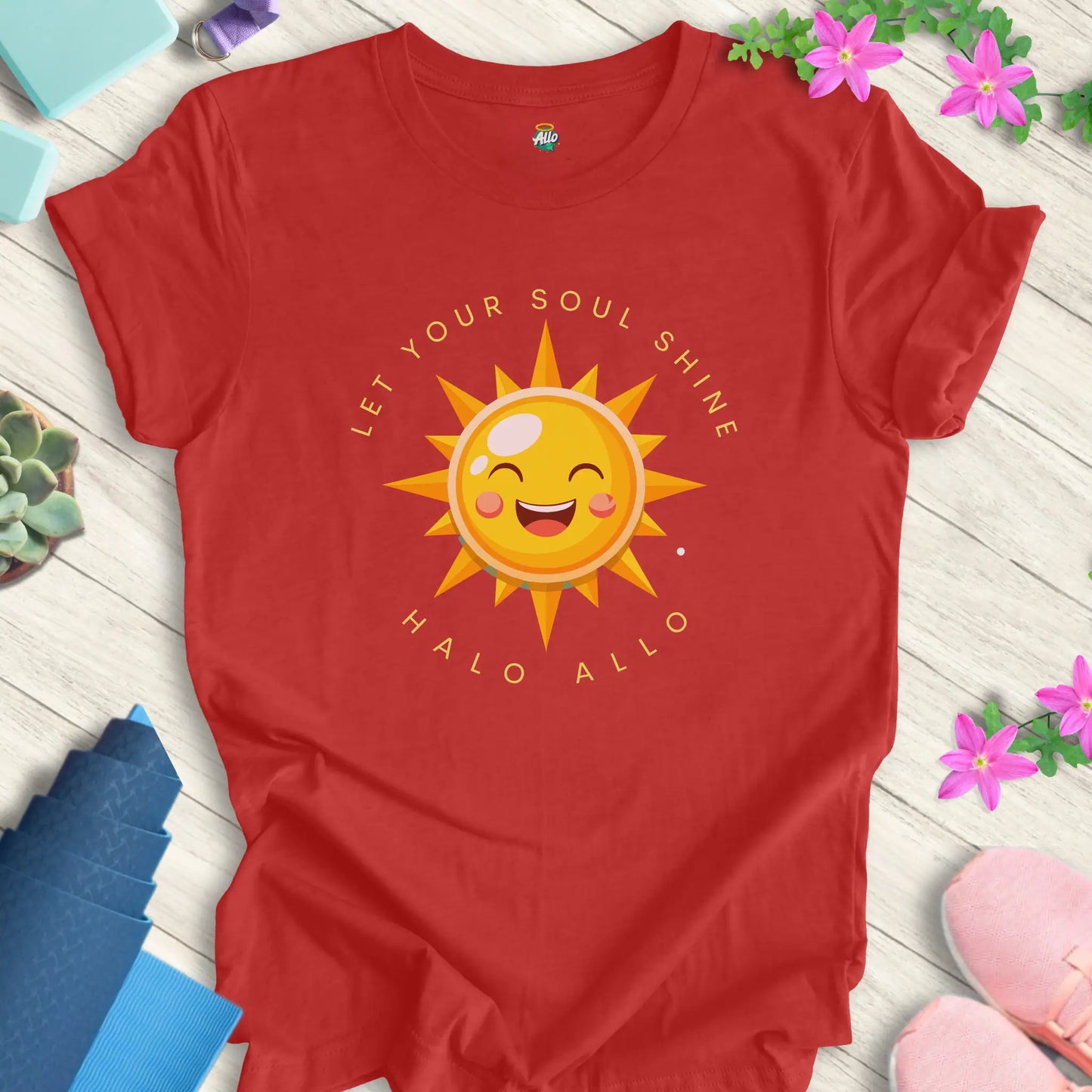 Heather Red yoga t-shirt with 'Let Your Soul Shine' design, featuring a smiling sun and motivational message by Halo Allo.