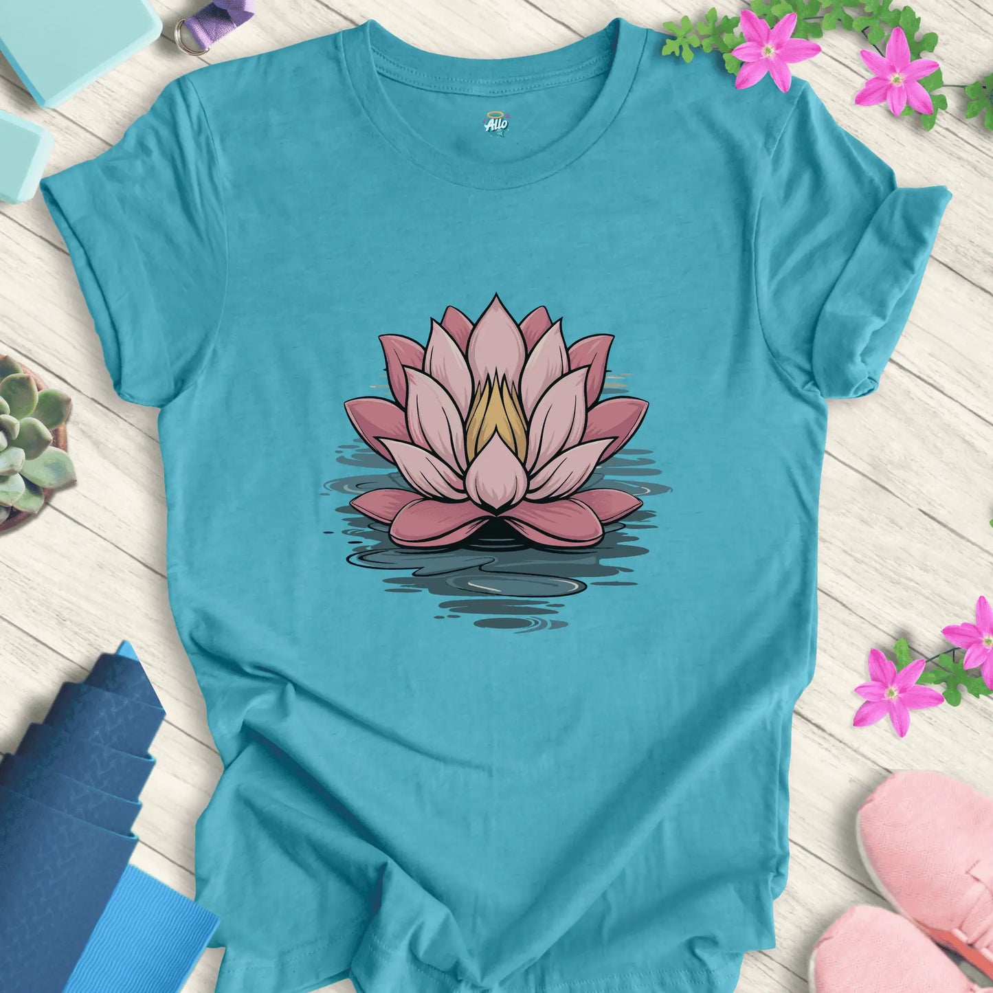 Heather Aqua yoga t-shirt featuring a minimalist lotus flower design, perfect for meditation, by Halo Allo.