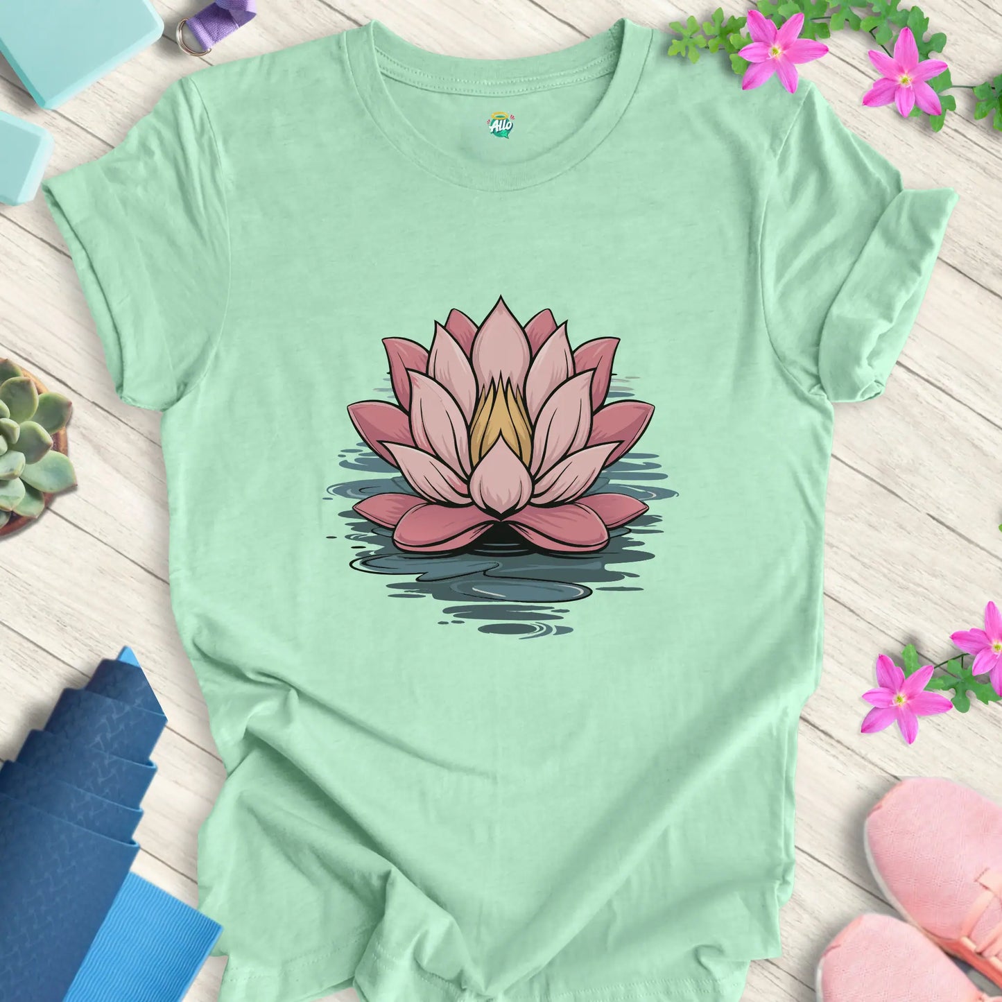 Heather Mint yoga t-shirt featuring a minimalist lotus flower design, perfect for meditation, by Halo Allo.