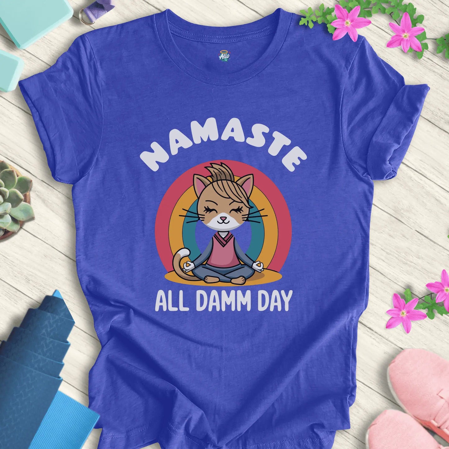 Heather True Royal yoga t-shirt with 'Namaste All Damm Day' design featuring a meditative cat by Halo Allo. Perfect for spiritual practice and casual wear.