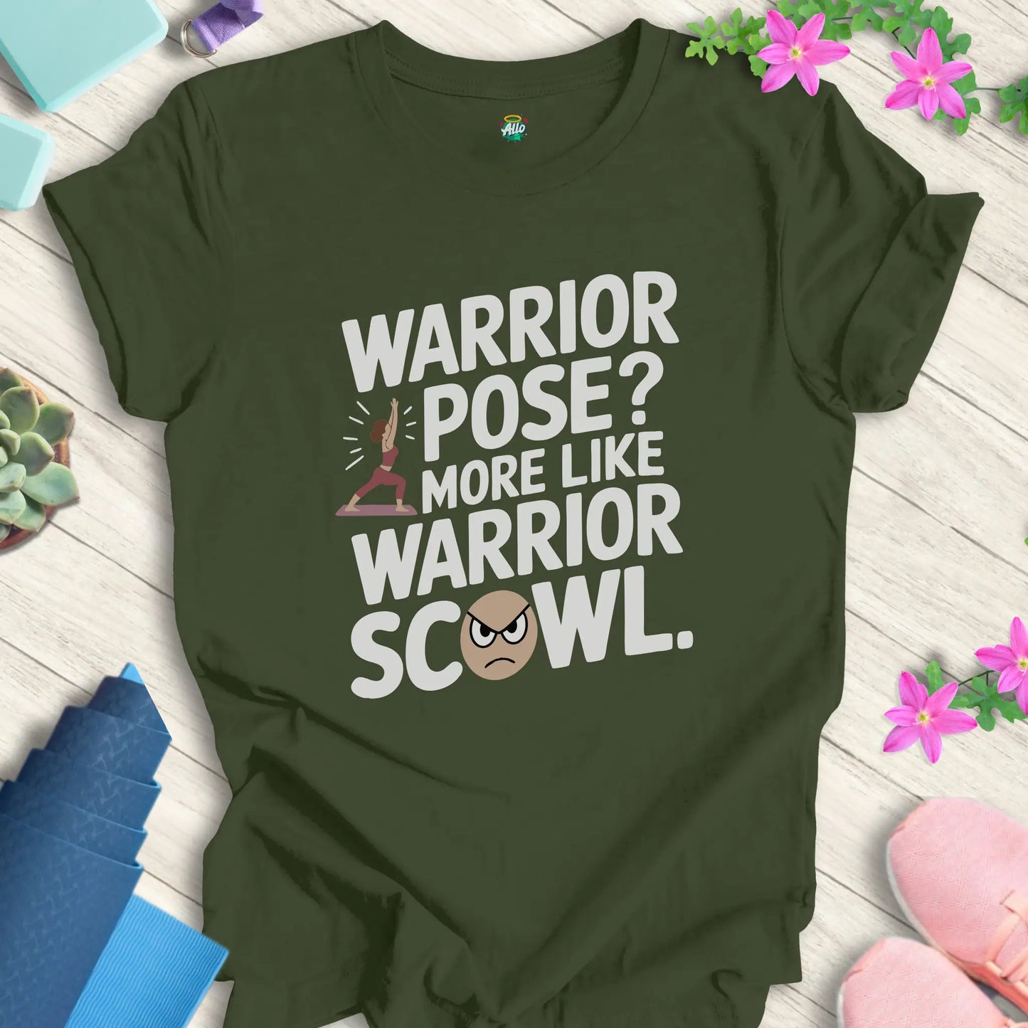 Military Green yoga t-shirt with warrior pose and scowl design, featuring 'Warrior Scowl' text by Halo Allo.