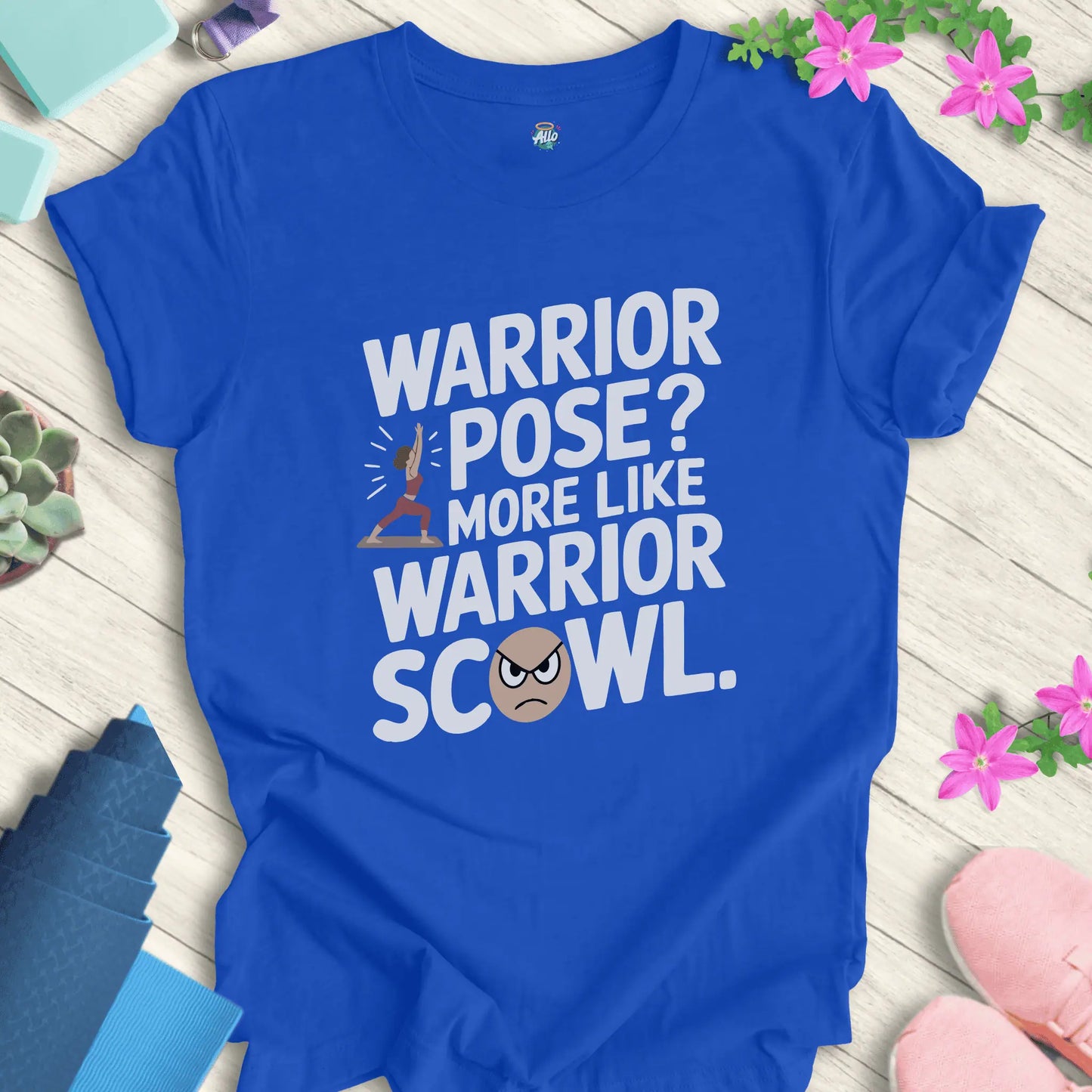 True Royal yoga t-shirt with warrior pose and scowl design, featuring 'Warrior Scowl' text by Halo Allo.