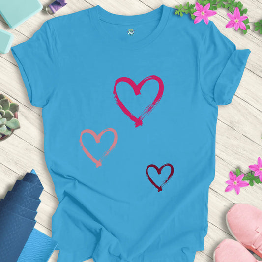 Aqua yoga t-shirt with 'Halo Allo Love All Around' design, featuring three heart motifs, perfect for spiritual wellness.