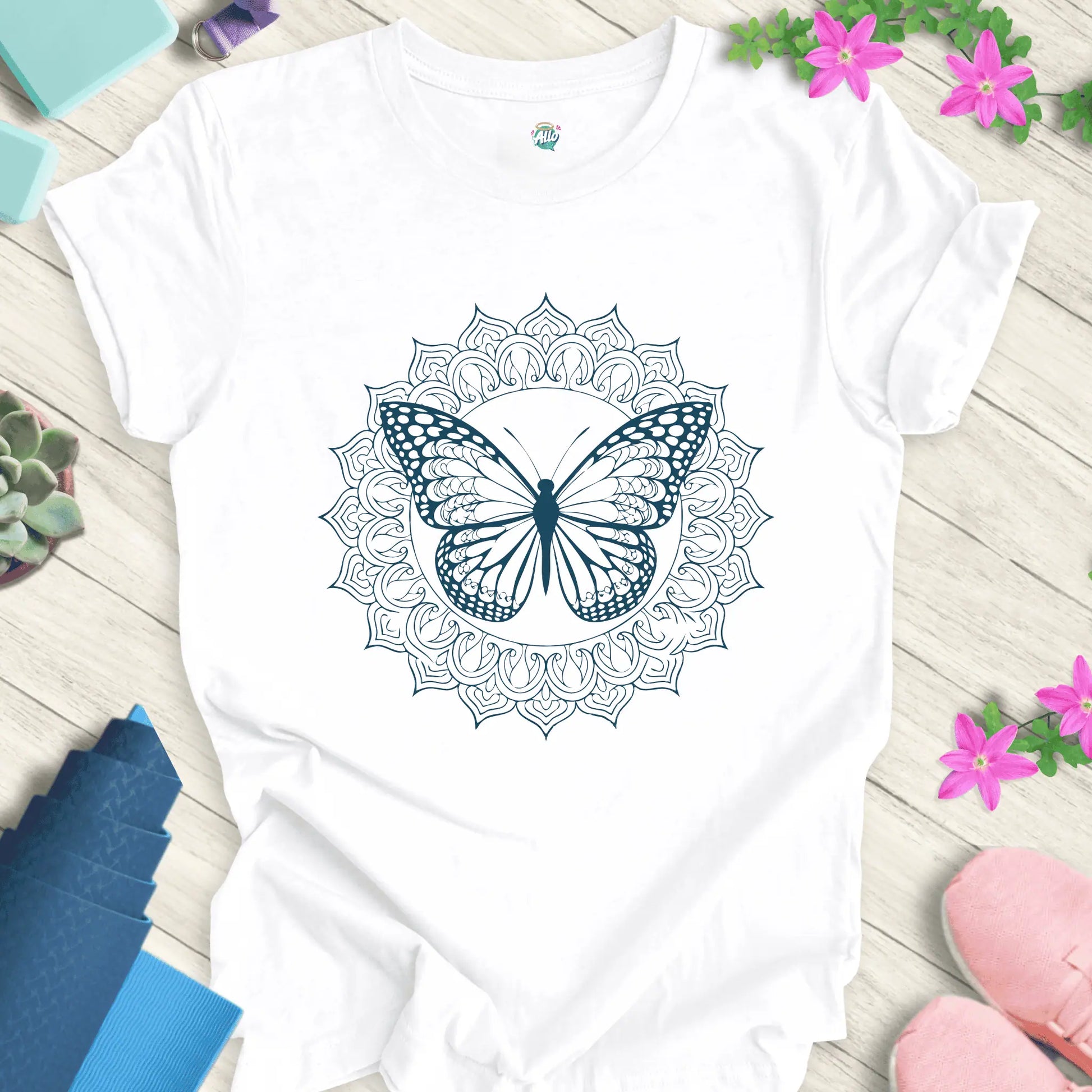White yoga t-shirt featuring a mandala butterfly design, perfect for meditation and everyday wear.