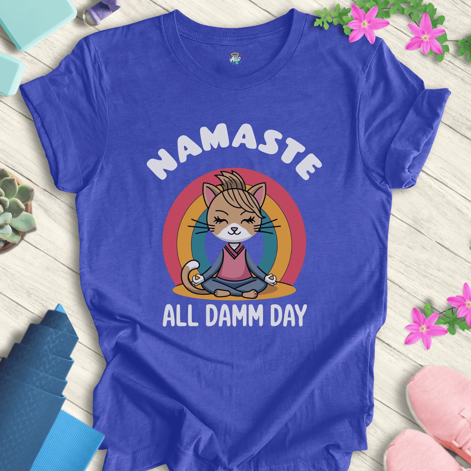 Heather True Royal yoga t-shirt with 'Namaste All Damm Day' design featuring a meditative cat by Halo Allo. Perfect for spiritual practice and casual wear.