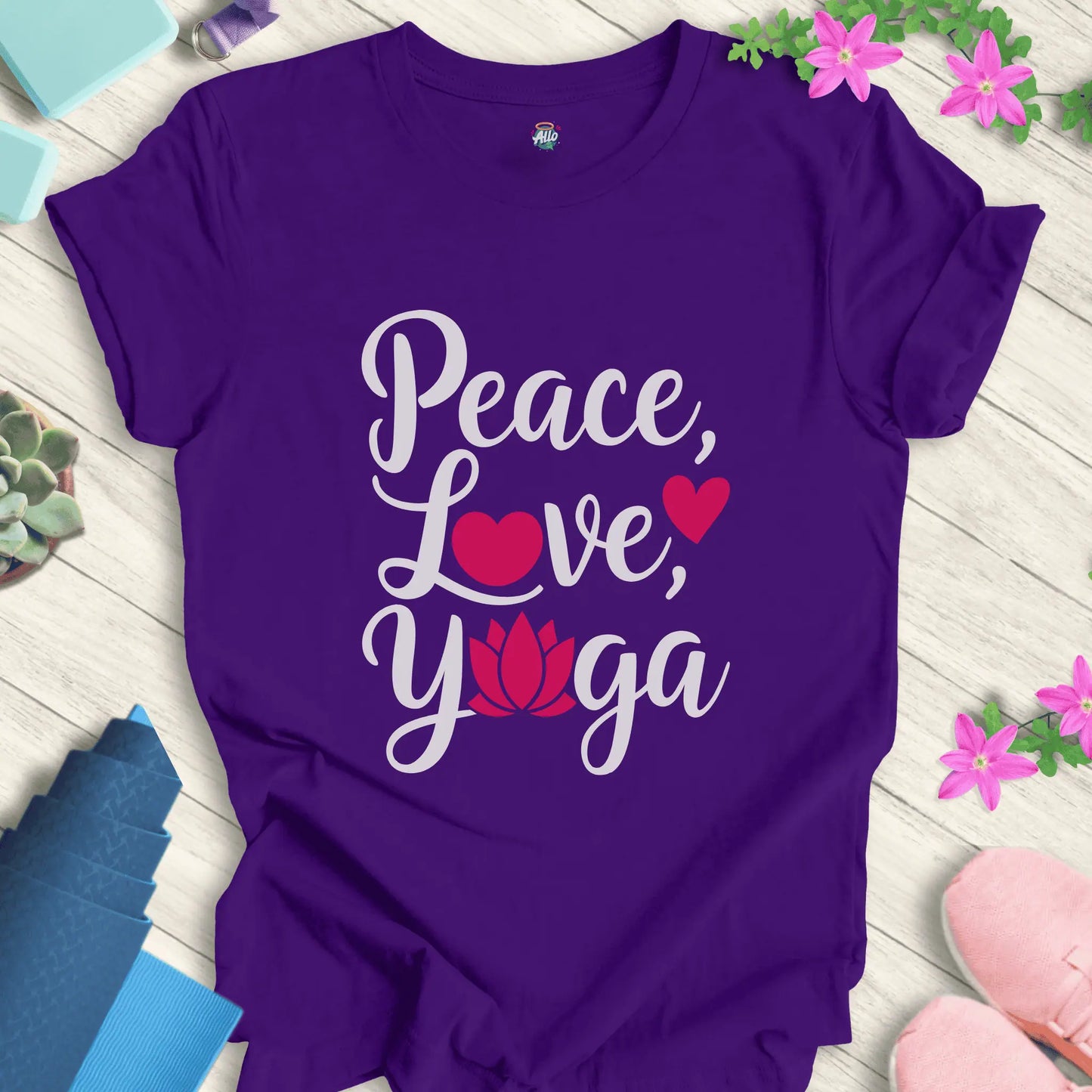 Team Purple yoga t-shirt with 'Peace, Love, Yoga' design featuring a lotus flower and heart symbols, perfect for meditation and mindfulness.