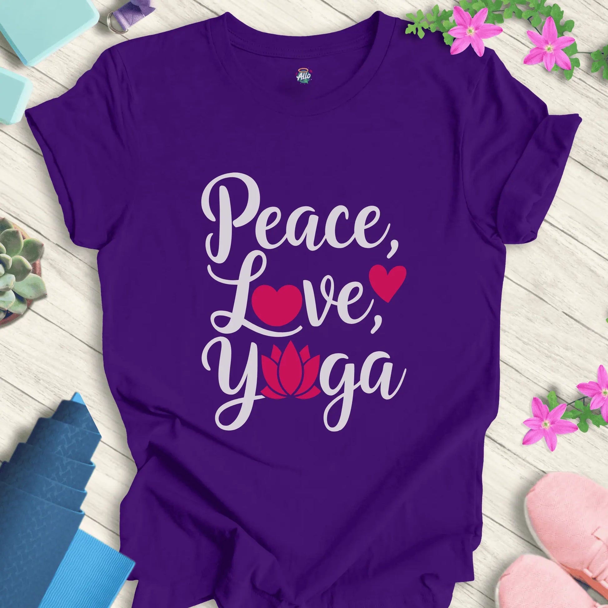 Team Purple yoga t-shirt with 'Peace, Love, Yoga' design featuring a lotus flower and heart symbols, perfect for meditation and mindfulness.