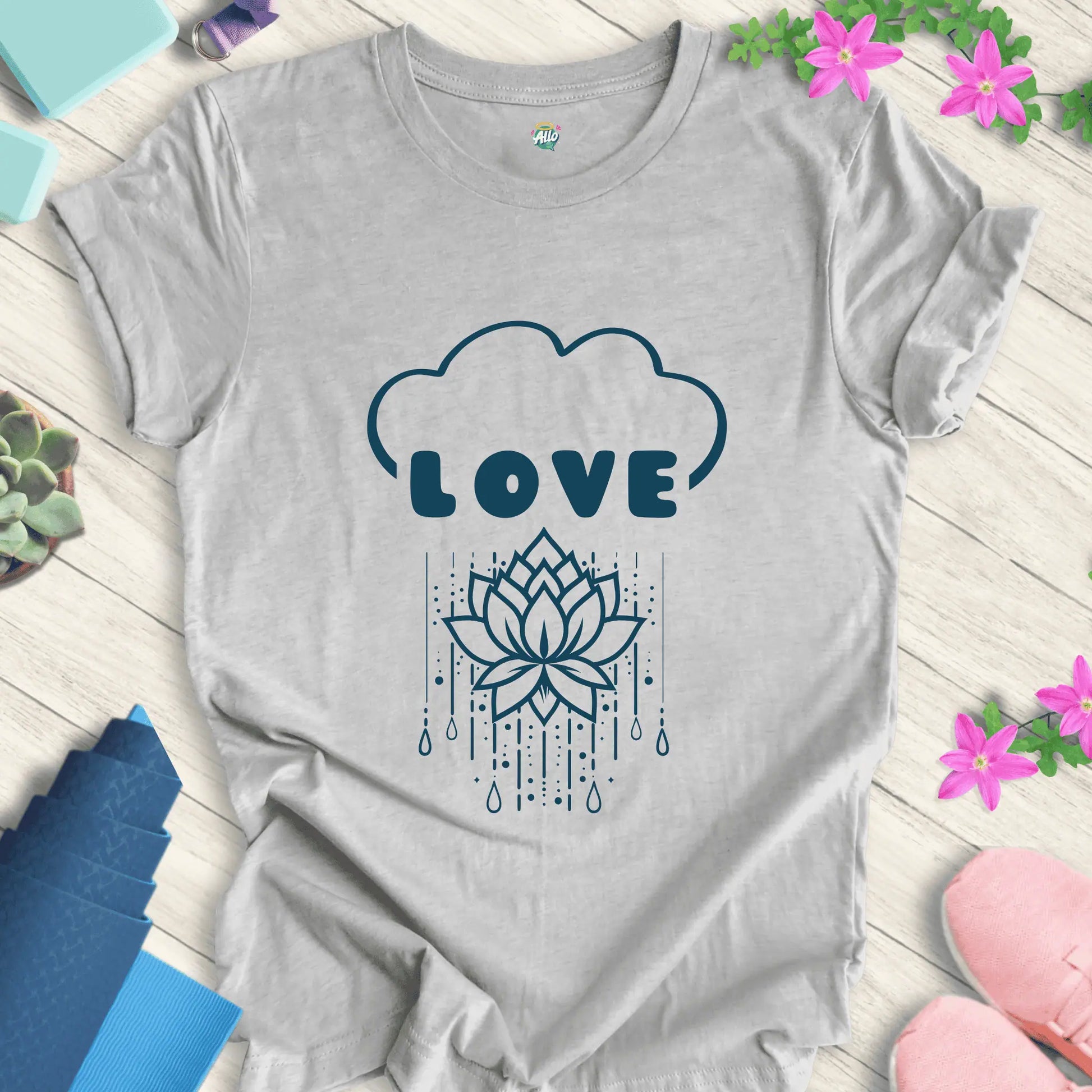 Athletic Heather yoga t-shirt with 'Rain Down Love' design featuring a lotus flower and cloud motif by Halo Allo.