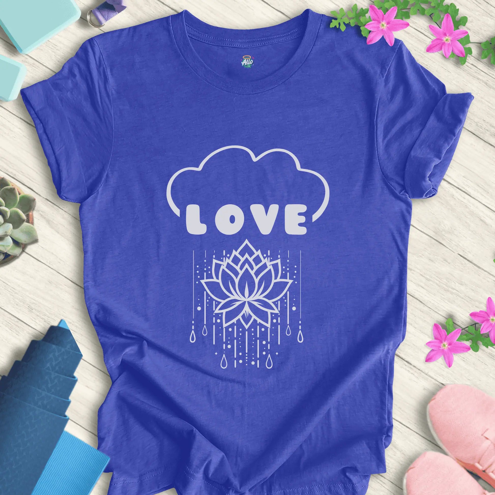 Heather True Royal yoga t-shirt with 'Rain Down Love' design featuring a lotus flower and cloud motif by Halo Allo.