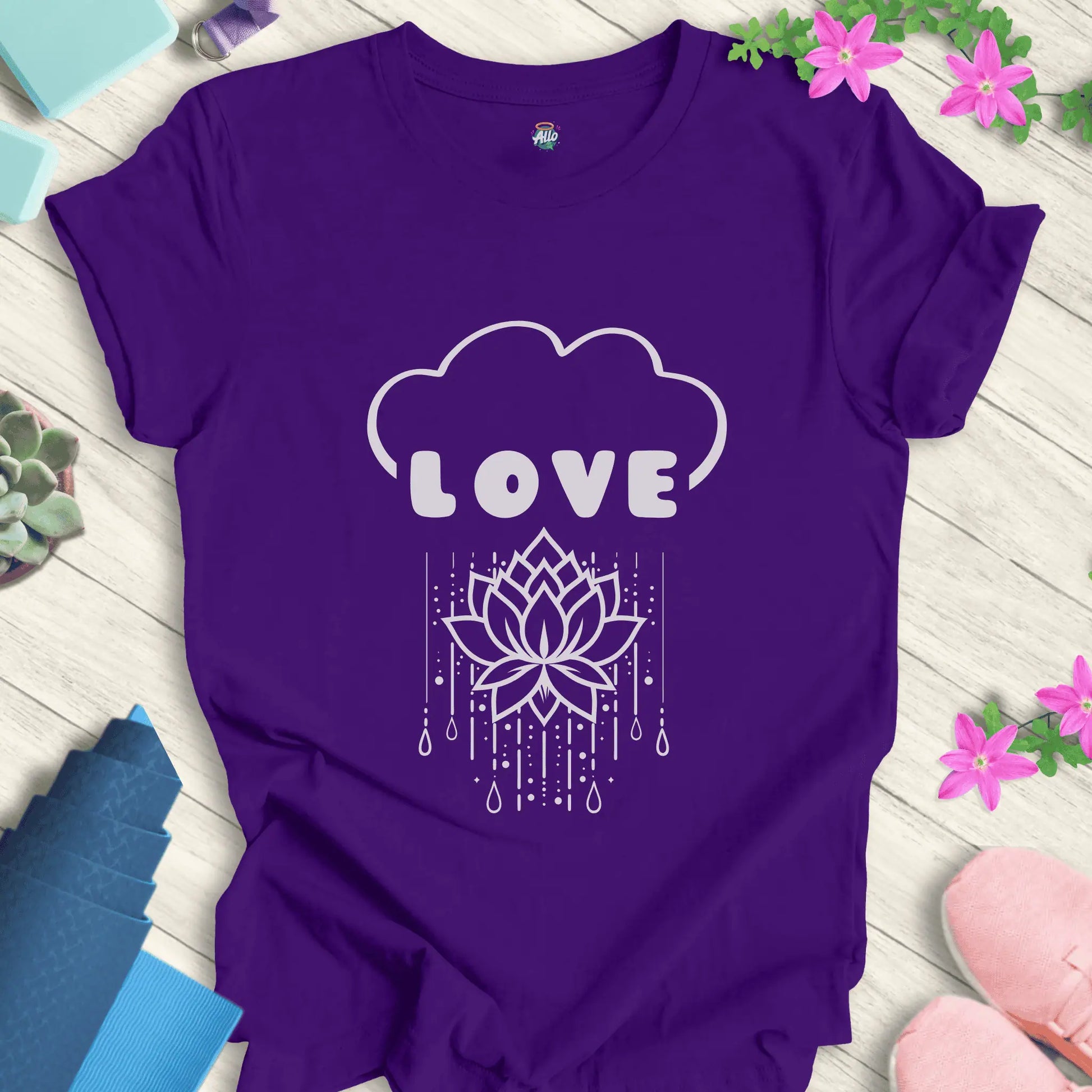Team Purple yoga t-shirt with 'Rain Down Love' design featuring a lotus flower and cloud motif by Halo Allo.