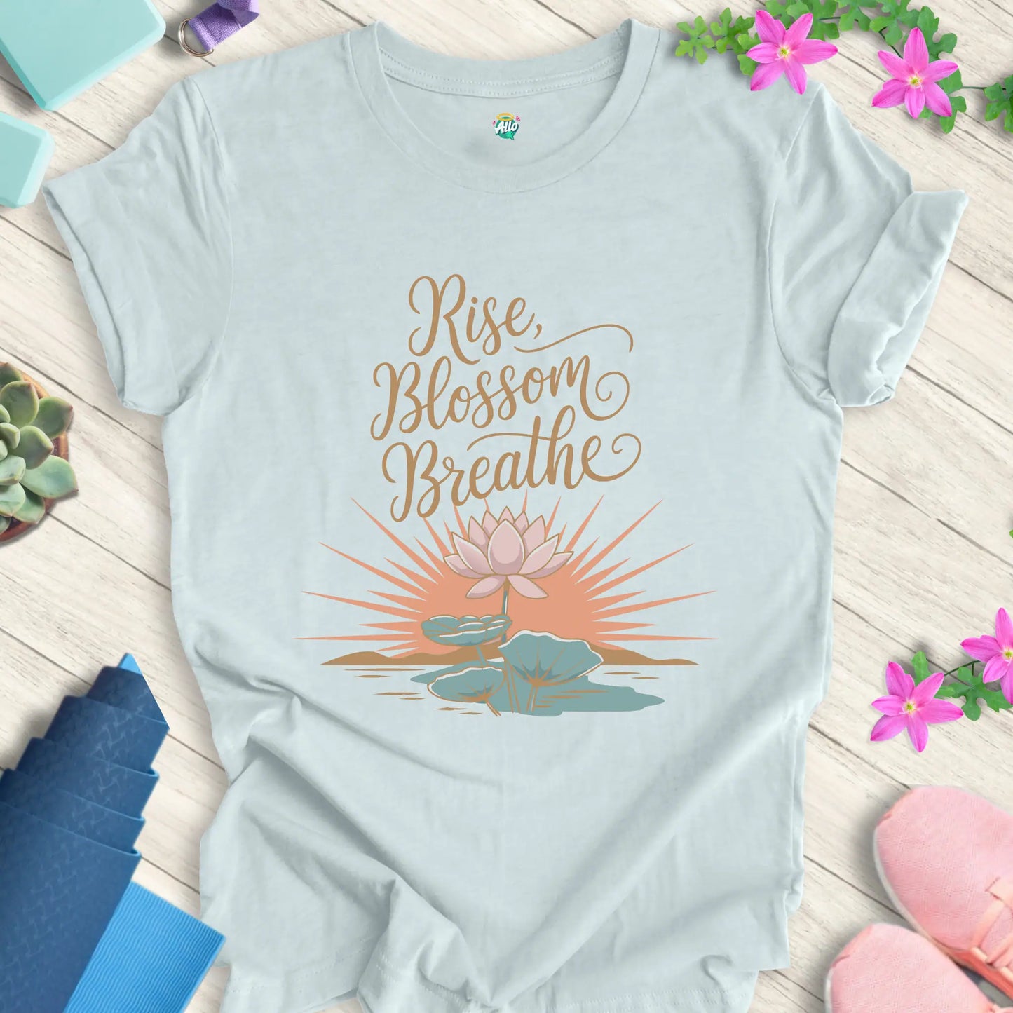 Heather Ice Blue yoga t-shirt with 'Rise Blossom Breathe' lotus design by Halo Allo, perfect for meditation and spirituality enthusiasts.