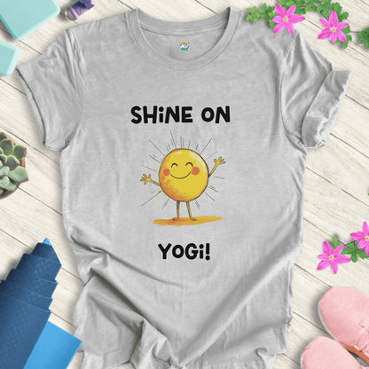 Athletic Heather yoga t-shirt with 'Shine On Yogi!' text and cheerful sun design by Halo Allo, perfect for meditation and spiritual wellness.