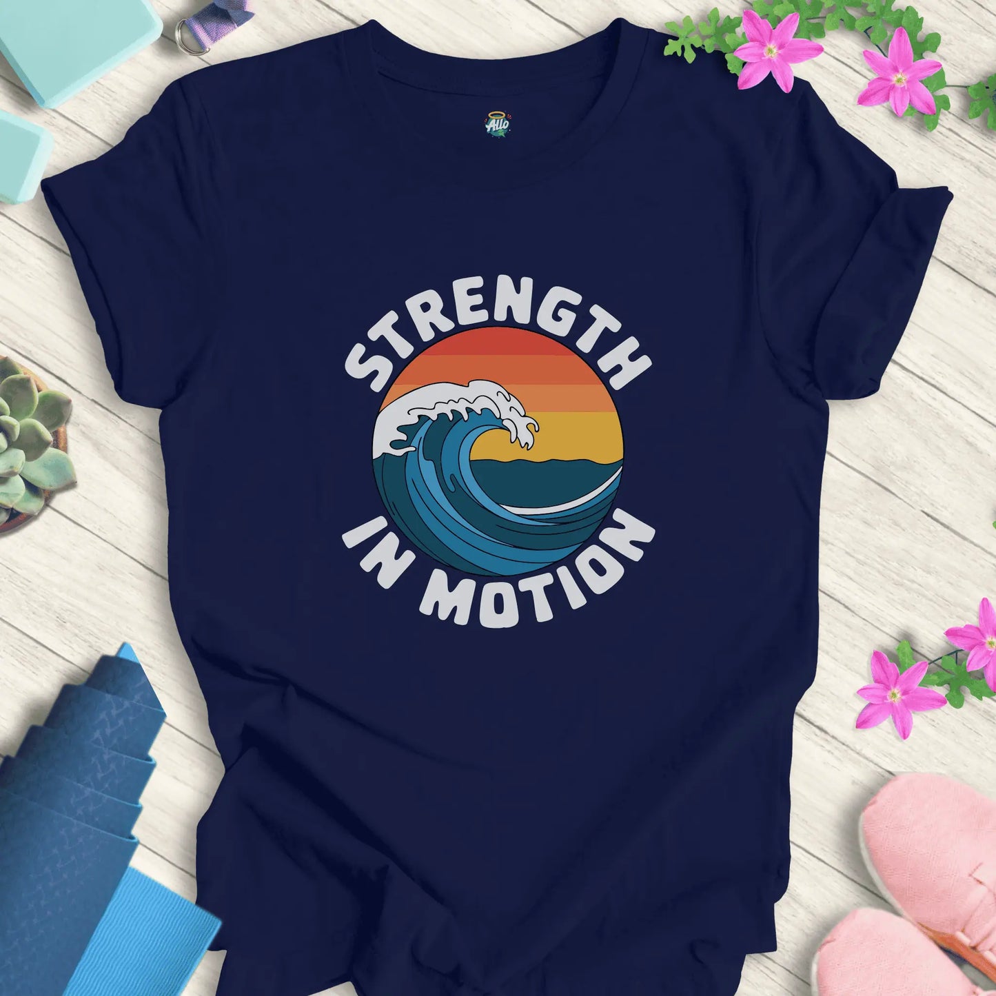 Navy yoga t-shirt with 'Strength In Motion' design by Halo Allo, featuring a wave graphic. Perfect for meditation and mindfulness.