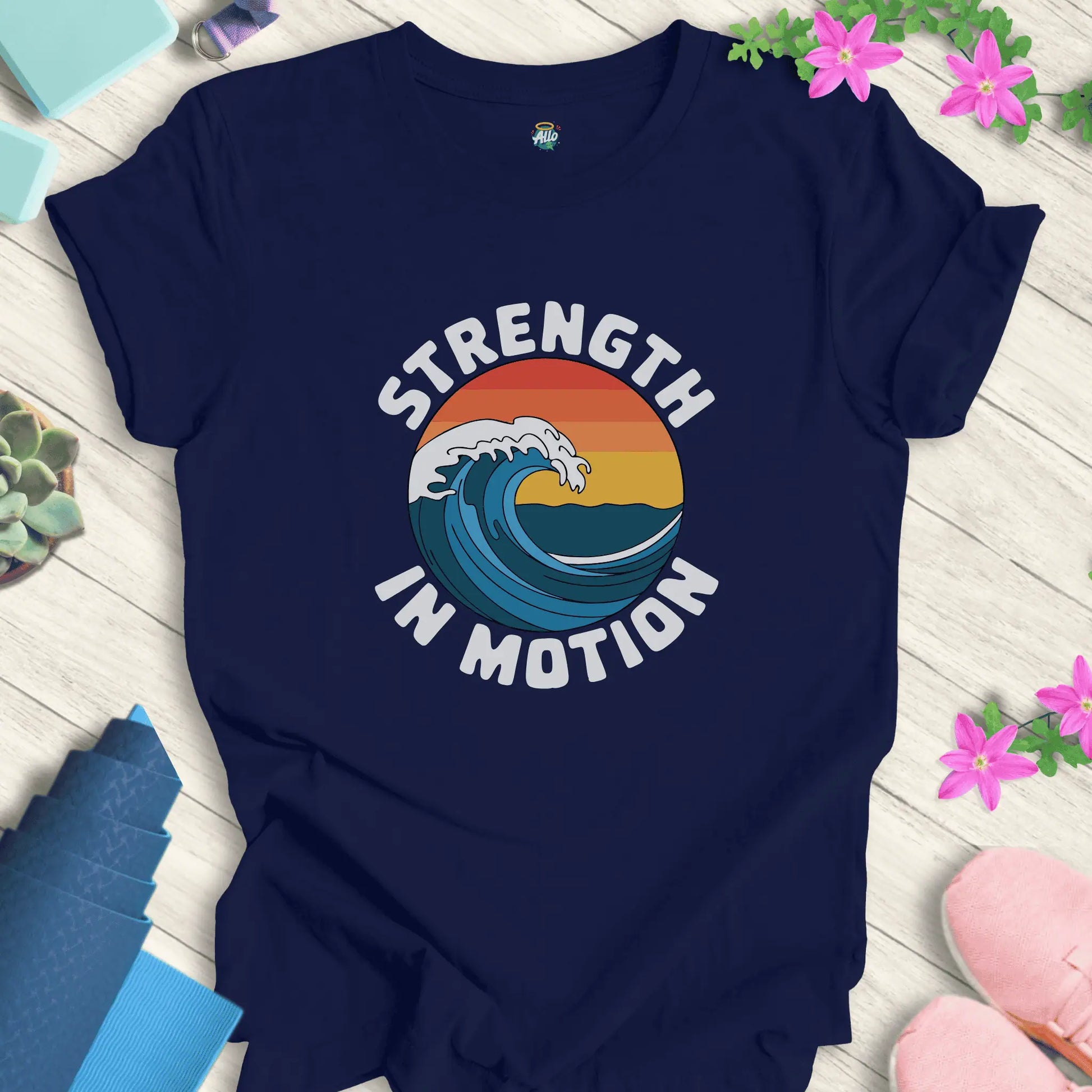 Navy yoga t-shirt with 'Strength In Motion' design by Halo Allo, featuring a wave graphic. Perfect for meditation and mindfulness.