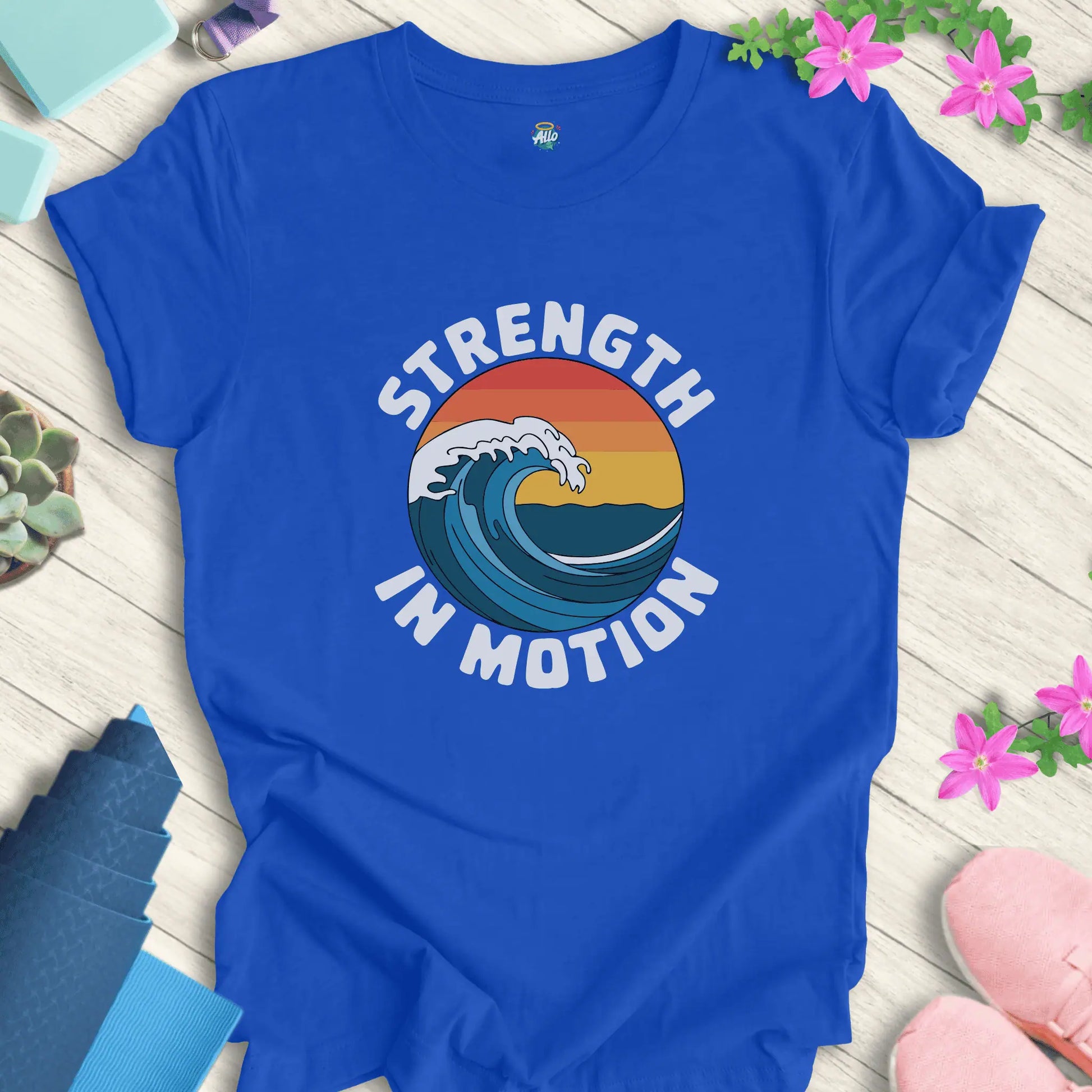 True Royal yoga t-shirt with 'Strength In Motion' design by Halo Allo, featuring a wave graphic. Perfect for meditation and mindfulness.