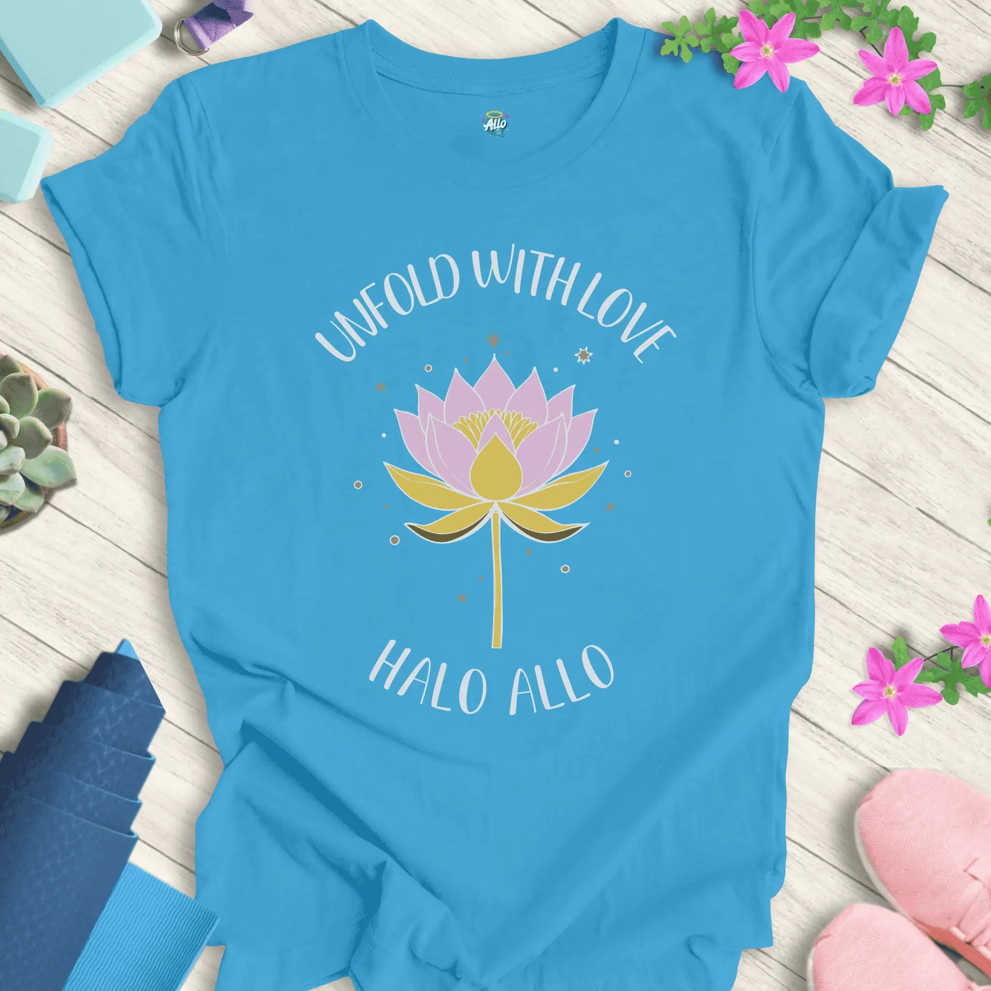 Aqua yoga t-shirt with 'Unfold With Love' design and minimalist lotus flower by Halo Allo.