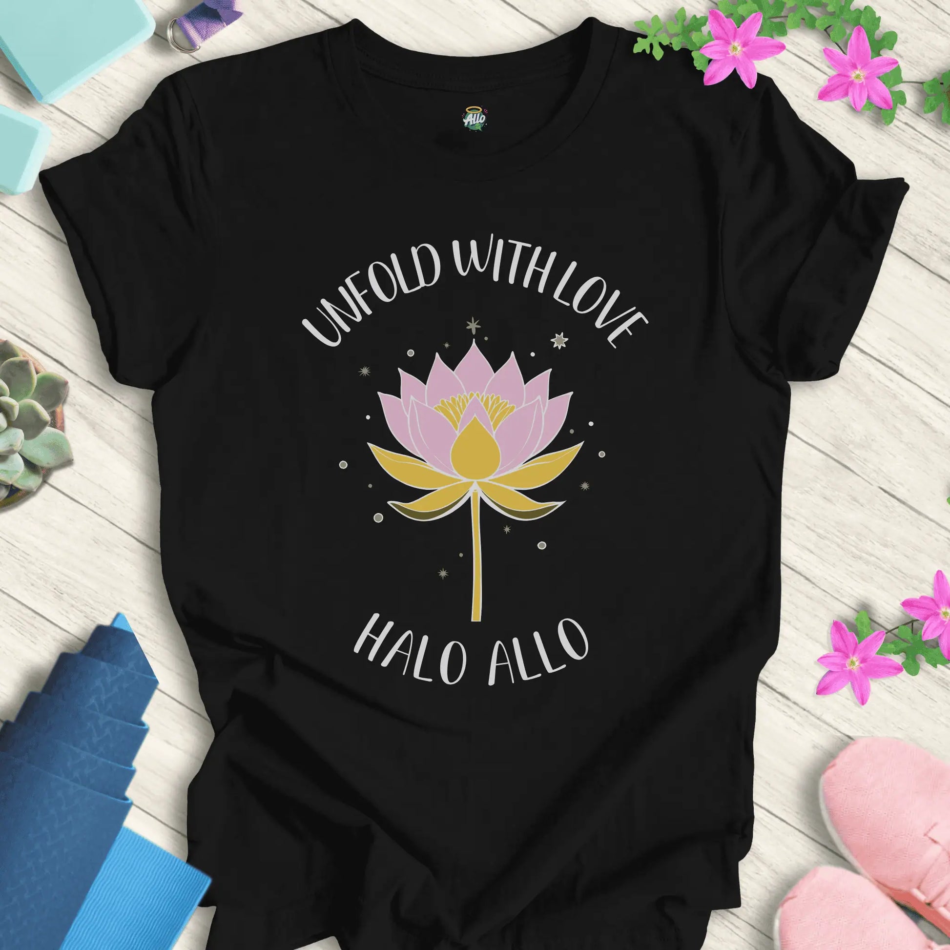 Black yoga t-shirt with 'Unfold With Love' design and minimalist lotus flower by Halo Allo.